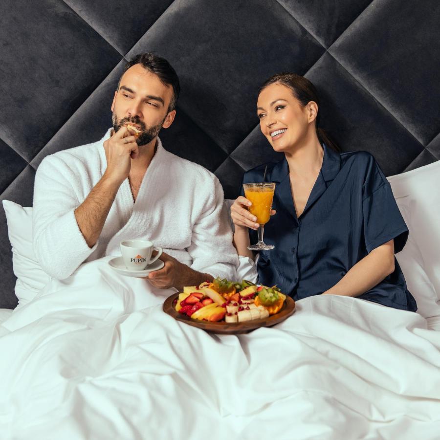 Hotel Pupin Нови Сад Екстериор снимка A couple having breakfast in bed